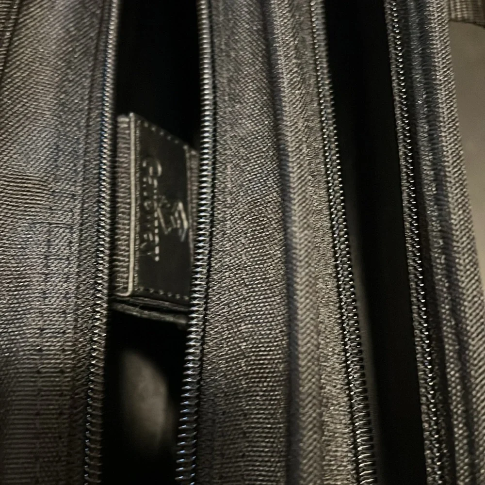 NWT black computer case with hand and shoulder straps
